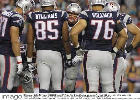 New England Patriots quarterback Tom Brady (12) calls a play in the huddle in the first quarter against the Pittsburgh Steelers at Gillette Stadium in Foxborough, Massachusetts on September 10, 2015.  BOS2015091007 MATTHEWxHEALEY