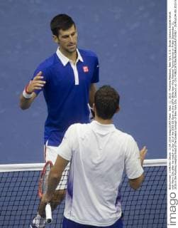 Sept. 11, 2015 - Flushing Meadows, New York, U.S - Novak Djokovic shakes hands with Marin Cilic after his match on Day 12 of the 2015 US Open at the USTA Billie Jean King National Tennis Center on Friday September 11, 2015 in the Flushing neighborhood of the Queens borough of New York City. Djokovic vs. Cilic - ZUMAp124
