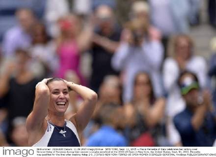 NEW YORK, Sept. 11, 2015 -- Flavia Pennetta of Italy celebrates her victory over Simona Halep of Romania during their women s singles semifinal at the 2015 US Open in New York, the United States, Sept. 11, 2015. Pennetta was qualified for the final after beating Halep 2-0. ) (SP)US-NEW YORK-TENNIS-US OPEN-WOMEN S SINGLES-SEMIFINAL YinxBogu 