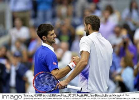 NEW YORK, Sept. 11, 2015 -- Novak Djokovic (L) of Serbia shakes hands with Marin Cilic of Croatia after competing in their men s singles semifinal at the 2015 US Open in New York, the United States, Sept. 11, 2015. Djokovic was qualified for the final after beating Cilic 3-0. ) (SP)US-NEW YORK-TENNIS-US OPEN-MEN S SINGLES-SEMIFINAL YinxBogu 