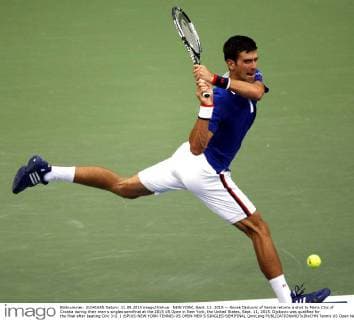 NEW YORK, Sept. 11, 2015 -- Novak Djokovic of Serbia returns a shot to Marin Cilic of Croatia during their men s singles semifinal at the 2015 US Open in New York, the United States, Sept. 11, 2015. Djokovic was qualified for the final after beating Cilic 3-0. ) (SP)US-NEW YORK-TENNIS-US OPEN-MEN S SINGLES-SEMIFINAL QinxLang 