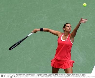 Roberta Vinci of Italy serves to Flavia Pennetta, also of Italy, in the first set of their women s final match at Arthur Ashe Stadium during the US Open Tennis Championships at the USTA Billie Jean King National Tennis Center in New York City on September 12, 2015.  NYP20150912301 MONIKAxGRAFF