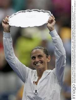 Sept. 12, 2015 - Flushing Meadows, New York, U.S - Roberta Vinci poses with her runner-up trophy on Day 13 of the 2015 US Open after losing to Flavia Pennetta at the USTA Billie Jean King National Tennis Center on Saturday September 12, 2015 in the Flushing neighborhood of the Queens borough of New York City. Pennetta won by a score of 7-6(7-4), 6-2. Pennetta vs. Vinci - ZUMAp124