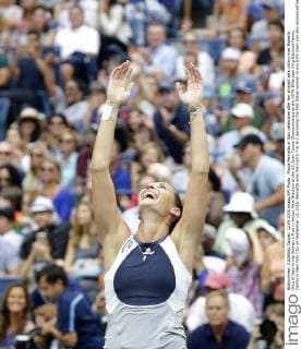 Flavia Pennetta of Italy celebrates after her straight sets victory over Roberta Vinci of Italy in the Women s Final in Arthur Ashe Stadium at the US Open Tennis Championships at the USTA Billie Jean King National Tennis Center in New York City on September 12, 2015. Pennetta wins the match 7-6, 6-2 becoming the first Italian women to win a US Open and also announced her retirement at the Trophy Ceremony.  NYP20150912128 JOHNxANGELILLO