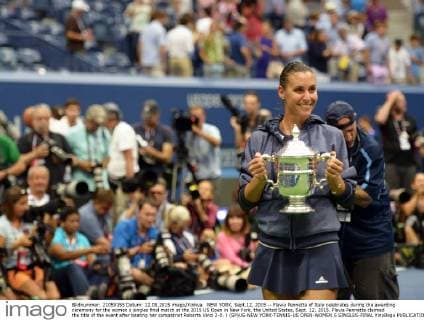 NEW YORK, Sept.12, 2015 -- Flavia Pennetta of Italy celebrates during the awarding ceremony for the women s singles final match at the 2015 US Open in New York, the United States, Sept. 12, 2015. Flavia Pennetta claimed the title of the event after beating her compatriot Roberta Vinci 2-0. ) (SP)US-NEW YORK-TENNIS-US OPEN-WOMEN S SINGLES-FINAL YinxBogu 