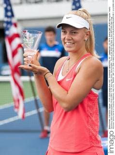 FLUSHING MEADOWS, NY - September 13, 2015: Dalma Galfi (HUN) during the Trophy Ceremony after defeating Sofia Kenin (USA) 75 64 during the Junior Girls Singles - Final of the 2015 US Open at the USTA Billy Jean King National Tennis Center in Flushing Meadows, New York. TENNIS: SEP 13 US Open Icon150913095 EDITORIAL USE ONLY