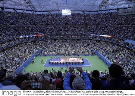 The United States flay is unfurled at center court in ceremonies before Roger Federer of Switzerland faced Novak Djokovic of Serbia in the Men s Final in Arthur Ashe Stadium at the US Open Tennis Championships at the USTA Billie Jean King National Tennis Center in New York City on September 13, 2015.  NYP20150913810 RAYxSTUBBLEBINE