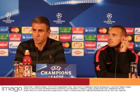 Head coach of Galatasaray, Hamza Hamzaoglu (L), and player Wesley Sneijder attend a press conference PK Pressekonferenz following a training session in Istanbul, Turkey, 14 September 2015. Galatasaray will face Atletico Medrid in a UEFA Champions League Group C match on 15 September 2015. 