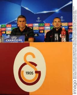 Head coach of Galatasaray, Hamza Hamzaoglu (L), and player Wesley Sneijder attend a press conference PK Pressekonferenz following a training session in Istanbul, Turkey, 14 September 2015. Galatasaray will face Atletico Medrid in a UEFA Champions League Group C match on 15 September 2015. 