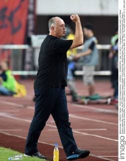 (150915) -- GUANGZHOU , Sep. 15, 2015 -- Guangzhou Evergrande coach Luiz Felipe Scolari celebrates victory after the AFC Champions League quarter-final second leg match between China s Guangzhou Evergrande and Japan s Kashiwa Reysol at Guangzhou Tianhe Sports Centre in Guangzhou, south China s Guangdong Province, Sept. 15, 2015. The match ended with a 1-1 draw and Guangzhou Evergrande advanced to the semifinal with 4-2 in aggregate. )(wll) (SP)CHINA-GUANGZHOU-SOCCER-AFC CHAMPIONS LEAGUE-QUARTERFINAL LiuxDawei 