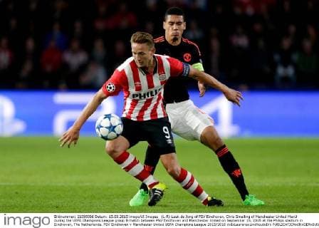 (L-R) Luuk de Jong of PSV Eindhoven, Chris Smalling of Manchester United ManU during the UEFA Champions League group B match between PSV Eindhoven and Manchester United on September 15, 2015 at the Philips stadium in Eindhoven, The Netherlands. PSV Eindhoven v Manchester United UEFA Champions League 2015 2016 xVIxLaurensxLindhoutxIVx 4330273