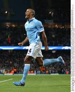 Vincent Kompany of Manchester City celebrates scoring the opening goal - Manchester City vs Juventus Turin - UEFA Champions League - Etihad Stadium - Manchester - 15 09 2015 EDITORIAL USE ONLY. No use with unauthorised audio, video, data, fixture lists, club league logos or live services. Online in-match use limited to 120 images, no video emulation. No use in betting, games or single club league player publications.