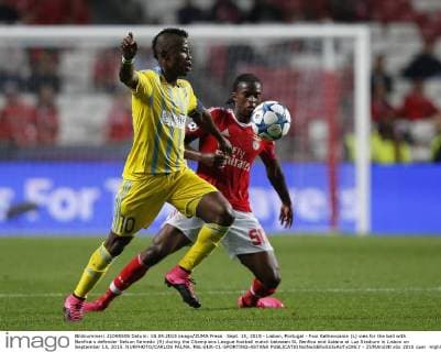 Sept. 15, 2015 - Lisbon, Portugal - Foxi Kethevoama (L) vies for the ball with Benfica s defender Nelson Semedo (R) during the Champions League football match between SL Benfica and Astana at Luz Stadium in Lisbon on September 15, 2015. NURPHOTO CARLOS PALMA. FBL-EUR-C1-SPORTING-ASTANA  - ZUMAn230