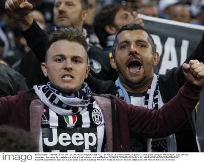 15.09.2015. Manchester, England. Champions League. Manchester City versus Juventus. Juventus fans celebrate at the final whistle. xAlanxMartinx  ActionPlus11660637