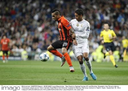 Real Madrid s Raphael Varane (R) and Shakhtar Donetsk s Alex Teixeira during Champions League soccer match between Real Madrid and Shakhtar Donetsk at Santiago Bernabeu stadium in Madrid, Spain. Spetember 15, 2015.  (20150915038)