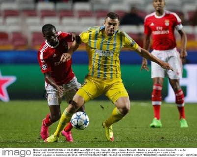 Sept. 15, 2015 - Lisbon, Portugal - Benfica s defender Nelson Semedo (L) vies for the ball with Astana s forward Aleksey Shchetkin (R) during the Champions League football match between SL Benfica and Astana at Luz Stadium in Lisbon on September 15, 2015. NURPHOTO CARLOS PALMA. FBL-EUR-C1-SPORTING-ASTANA  - ZUMAn230