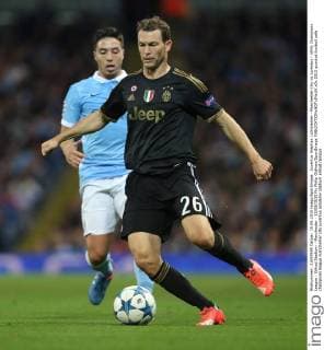 Juventus Stephan Lichtsteiner - Manchester City vs Juventus - UEFA Champions League - Etihad Stadium - Manchester - 15 09 2015 Pic Philip Oldham SportImage EDITORIAL USE ONLY. No use with unauthorised audio, video, data, fixture lists, club league logos or live services. Online in-match use limited to 120 images, no video emulation. No use in betting, games or single club league player publications.