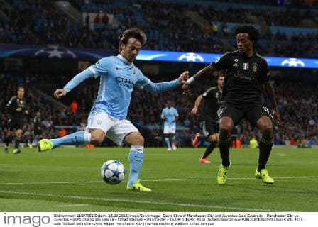 David Silva of Manchester City and Juventus Juan Cuadrado - Manchester City vs Juventus - UEFA Champions League - Etihad Stadium - Manchester - 15 09 2015 Pic Philip Oldham SportImage EDITORIAL USE ONLY. No use with unauthorised audio, video, data, fixture lists, club league logos or live services. Online in-match use limited to 120 images, no video emulation. No use in betting, games or single club league player publications.