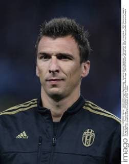 Juventus Mario Mandzukic - Manchester City vs Juventus - UEFA Champions League - Etihad Stadium - Manchester - 15 09 2015 Pic Philip Oldham SportImage EDITORIAL USE ONLY. No use with unauthorised audio, video, data, fixture lists, club league logos or live services. Online in-match use limited to 120 images, no video emulation. No use in betting, games or single club league player publications.