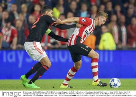 (L-R) Chris Smalling of Manchester United ManU Luuk de Jong of PSV during the UEFA Champions League group B match between PSV Eindhoven and Manchester United on September 15, 2015 at the Philips stadium in Eindhoven, The Netherlands. PSV Eindhoven v Manchester United UEFA Champions League 2015 2016 xVIxxIVx 4331907