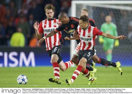 (L-R) Davy Propper of PSV, Ashley Young of Manchester United ManU Santiago Arias of PSV during the UEFA Champions League group B match between PSV Eindhoven and Manchester United on September 15, 2015 at the Philips stadium in Eindhoven, The Netherlands. PSV Eindhoven v Manchester United UEFA Champions League 2015 2016 xVIxxIVx 4331915