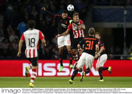 Chris Smalling of Manchester United ManU FC (CL), Luuk de Jong of PSV (CR) during the UEFA Champions League group B match between PSV Eindhoven and Manchester United on September 15, 2015 at the Philips stadium in Eindhoven, The Netherlands. PSV Eindhoven v Manchester United UEFA Champions League 2015 2016 xVIxJeroenxPutmansxIVx 4333031