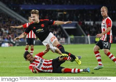 Eindhoven - Manchester United ManU player Luke Shaw sustains a serious leg injury out of this duel with Hector Moreno. Photographer: Robert Meerding 
