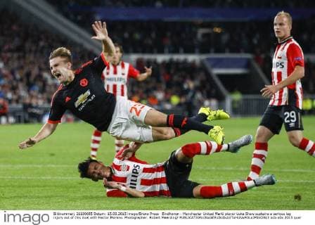 Eindhoven - Manchester United ManU player Luke Shaw sustains a serious leg injury out of this duel with Hector Moreno. Photographer: Robert Meerding 