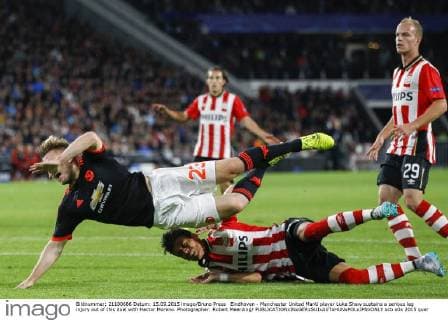 Eindhoven - Manchester United ManU player Luke Shaw sustains a serious leg injury out of this duel with Hector Moreno. Photographer: Robert Meerding 