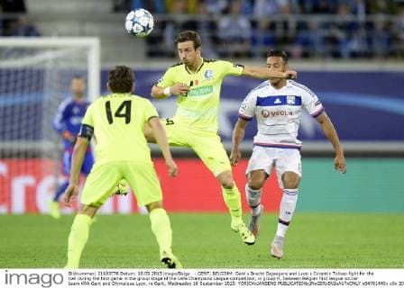 - GENT, BELGIUM: Gent s Brecht Dejaegere and Lyon s Corentin Tolisso fight for the ball during the first game in the group stage of the Uefa Champions League competition, in group H, between Belgian first league soccer team KAA Gent and Olympique Lyon, in Gent, Wednesday 16 September 2015. YORICKxJANSENS  x04701445x