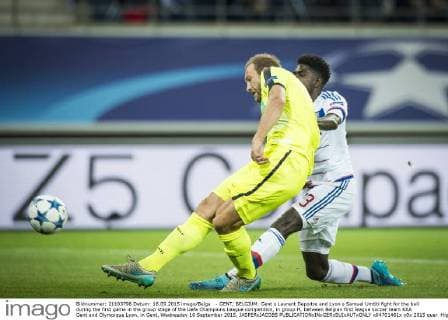 - GENT, BELGIUM: Gent s Laurent Depoitre and Lyon s Samuel Umtiti fight for the ball during the first game in the group stage of the Uefa Champions League competition, in group H, between Belgian first league soccer team KAA Gent and Olympique Lyon, in Gent, Wednesday 16 September 2015. JASPERxJACOBS  x04701461x