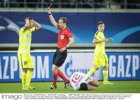 - GENT, BELGIUM: Gent s Brecht Dejaegere receives a red card during the first game in the group stage of the Uefa Champions League competition, in group H, between Belgian first league soccer team KAA Gent and Olympique Lyon, in Gent, Wednesday 16 September 2015. JASPERxJACOBS  x04701543x