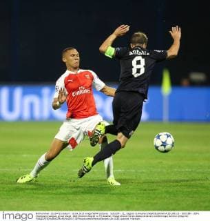 SOCCER - CL, Zagreb vs Arsenal ZAGREB,CROATIA,16.SEP.15 - SOCCER - UEFA Champions League, group stage, GNK Dinamo Zagreb vs FC Arsenal. Image shows Kieran Gibbs (Arsenal) and Domogoj Antolicc (Zagreb). GEPAxpictures xMaticxKlansek