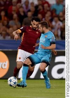 Sept. 16, 2015 - Rome, Itay - Mohamed Salah and Jordi Alba fight for the ball during the UEFA Champions League match between AS Roma and FC Barcelona Barca at Stadio Olimpico in Rome on September 16, 2015. AS Roma v FC Barcelona - UEFA Champions League - ZUMAn230