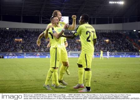 - GENT, BELGIUM: Gent s Danijel Milicevic, Gent s Laurent Depoitre and Gent s Moses Simon celebrate during the first game in the group stage of the Uefa Champions League competition, in group H, between Belgian first league soccer team KAA Gent and Olympique Lyon, in Gent, Wednesday 16 September 2015. YORICKxJANSENS  x04701625x