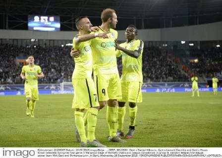 - GENT, BELGIUM: Gent s Danijel Milicevic, Gent s Laurent Depoitre and Gent s Moses Simon celebrate during the first game in the group stage of the Uefa Champions League competition, in group H, between Belgian first league soccer team KAA Gent and Olympique Lyon, in Gent, Wednesday 16 September 2015. YORICKxJANSENS  x04701623x