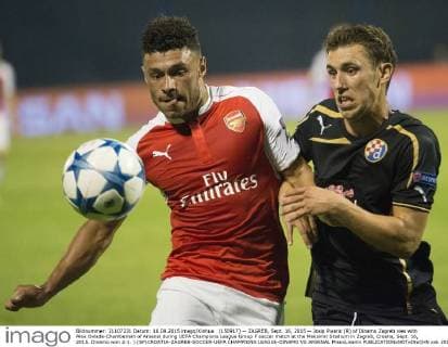 (150917) -- ZAGREB, Sept. 16, 2015 -- Josip Pivaric (R) of Dinamo Zagreb vies with Alex Oxlade-Chamberlain of Arsenal during UEFA Champions League Group F soccer match at the Maksimir Stadium in Zagreb, Croatia, Sept. 16, 2015. Dinamo won 2-1. ) (SP)CROATIA-ZAGREB-SOCCER-UEFA CHAMPIONS LEAGUE-DINAMO VS ARSENAL MisoxLisanin 