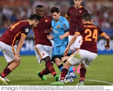 (150917) -- ROME, Sept. 16, 2015 -- Narcelona s Lionel Messi (C) breals through during their Champions League Group E stage match against AS Roma at the Olympic stadium in Rome, Italy, Sept. 16, 2015. The match tied 1-1. ) (SP)ITALY-ROME-SOCCER-UEFA CHAMPIONS LEAGUE-ROMA VS BARCELONA AlbertoxLingria 