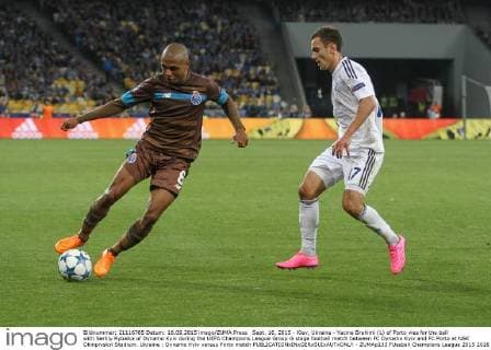 Sept. 16, 2015 - Kiev, Ukraine - Yacine Brahimi (L) of Porto vies for the ball with Serhiy Rybalka of Dynamo Kyiv during the UEFA Champions League Group G stage football match between FC Dynamo Kyiv and FC Porto at NSK Olimpiyskyi Stadium. Ukraine : Dynamo Kyiv versus Porto match - ZUMAp133