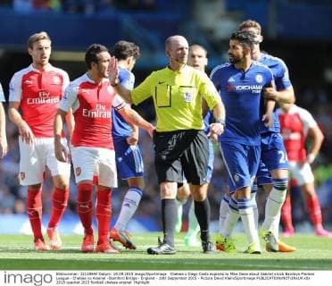 Chelsea s Diego Costa explains to Mike Dean about Gabriel s kick Barclays Premier League - Chelsea vs Arsenal -Stamford Bridge - England - 19th September 2015 - Picture David Klein Sportimage EDITORIAL USE ONLY. No use with unauthorised audio, video, data, fixture lists, club league logos or live services. Online in-match use limited to 120 images, no video emulation. No use in betting, games or single club league player publications.