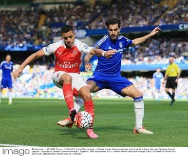 Chelsea s Cesc Fabregas tussles with Arsenal s Alexis Sanchez Barclays Premier League - Chelsea vs Arsenal -Stamford Bridge - England - 19th September 2015 - Picture David Klein Sportimage EDITORIAL USE ONLY. No use with unauthorised audio, video, data, fixture lists, club league logos or live services. Online in-match use limited to 120 images, no video emulation. No use in betting, games or single club league player publications.