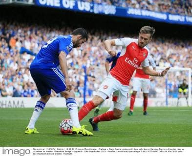 Chelsea s Diego Costa tussles with Arsenal s Aaron Ramsey Barclays Premier League - Chelsea vs Arsenal -Stamford Bridge - England - 19th September 2015 - Picture David Klein Sportimage EDITORIAL USE ONLY. No use with unauthorised audio, video, data, fixture lists, club league logos or live services. Online in-match use limited to 120 images, no video emulation. No use in betting, games or single club league player publications.