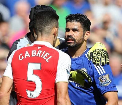 Chelsea s Diego Costa clashes with Arsenal s Gabriel as both players get booked Barclays Premier League - Chelsea vs Arsenal -Stamford Bridge - England - 19th September 2015 - Picture David Klein Sportimage EDITORIAL USE ONLY. No use with unauthorised audio, video, data, fixture lists, club league logos or live services. Online in-match use limited to 120 images, no video emulation. No use in betting, games or single club league player publications.