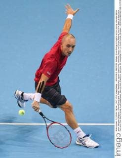 - BRUSSELS, BELGIUM: Belgian Steve Darcis pictured in action during a doubles tennis game between Belgium s Steve Darcis and Ruben Bemelmans versus Argentina s Leonardo Mayer and Carlos Berlocq, the third game in the Davis Cup semi final World Group meeting between Belgium and Argentina, Saturday 19 September 2015 in Vorst-Forest, Brussels. VIRGINIExLEFOUR  x04703510x