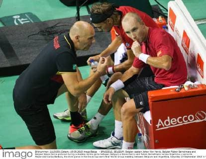 - BRUSSELS, BELGIUM: Belgian captain Johan Van Herck, Belgian Ruben Bemelmans and Belgian Steve Darcis pictured during a doubles tennis game between Belgium s Steve Darcis and Ruben Bemelmans versus Argentina s Leonardo Mayer and Carlos Berlocq, the third game in the Davis Cup semi final World Group meeting between Belgium and Argentina, Saturday 19 September 2015 in Vorst-Forest, Brussels. VIRGINIExLEFOUR  x04703505x