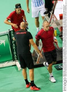 - BRUSSELS, BELGIUM: Belgian captain Johan Van Herck, Belgian Ruben Bemelmans and Belgian Steve Darcis celebrate during a doubles tennis game between Belgium s Steve Darcis and Ruben Bemelmans versus Argentina s Leonardo Mayer and Carlos Berlocq, the third game in the Davis Cup semi final World Group meeting between Belgium and Argentina, Saturday 19 September 2015 in Vorst-Forest, Brussels. VIRGINIExLEFOUR  x04703506x