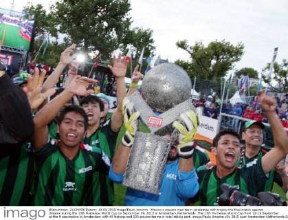 Mexico s players men team celebrates with trophy the final match against Ukraine during the 13th Homeless World Cup on September 19, 2015 in Amsterdam,Netherlands. The 13th Homeless World Cup from 12-19 September at the Museumplein in Amsterdam with 49 Nations and 500 players teams in total taking part. imago Paulo Amorim