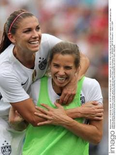 September 20, 2015: USA s Alex Morgan (13) and Tobin Heath (17) celebrate on the sidelines during the U.S. Women s soccer game vs Haiti at Legion Field in Birmingham, AL. SOCCER: SEP 20 Women s - Haiti v USA Icon159200078 EDITORIAL USE ONLY