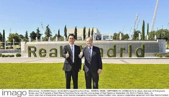 MADRID, SPAIN - SEPTEMBER 20: (CHINA OUT) Xu Jiayin, chairman of Evergrande Group, and The President of Real Madrid Florentino Perez visit the training base of Real Madrid on September 20, 2015 in Madrid, Spain. Xu Jiayin, chairman of Evergrande Group, which backed Guangzhou Evergrande Taobao Football Club, signed a cooperation agreement with Real Madrid Football Club.  CFP65819042 