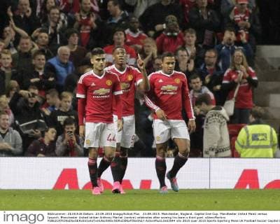 23.09.2015. Manchester, England. Capital One Cup. Manchester United ManU versus Ipswich. Manchester United striker Anthony Martial (centre) celebrates after scoring his team s third goal. xAlanxMartinx  ActionPlus11663544